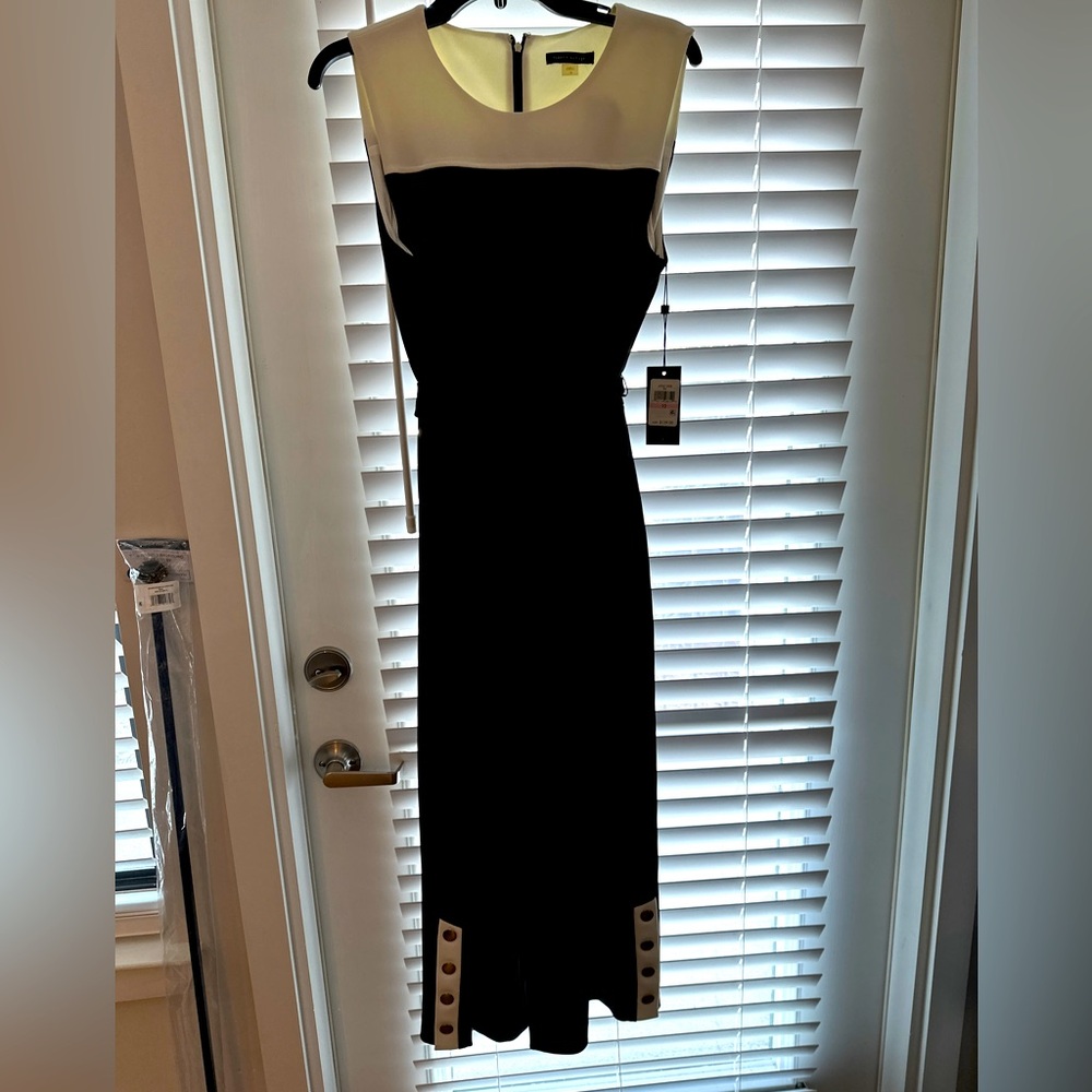 Black & White Tommy Hilfiger 1 piece pants suit with belt size 10 women’s